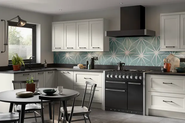 Light grey shaker with a patterned splashback