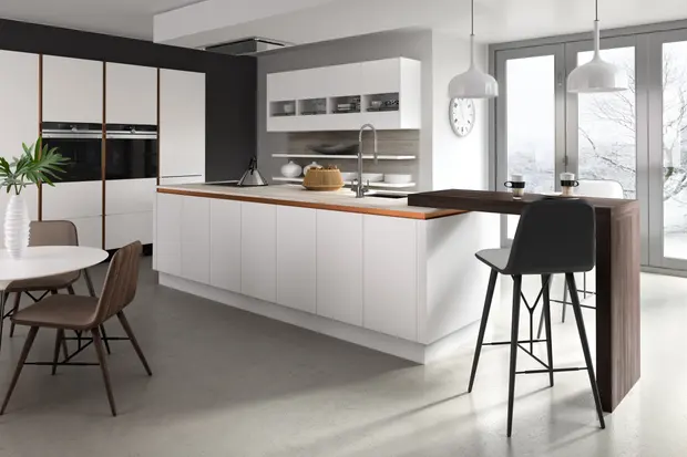 White slab cabinets with handle-less rail